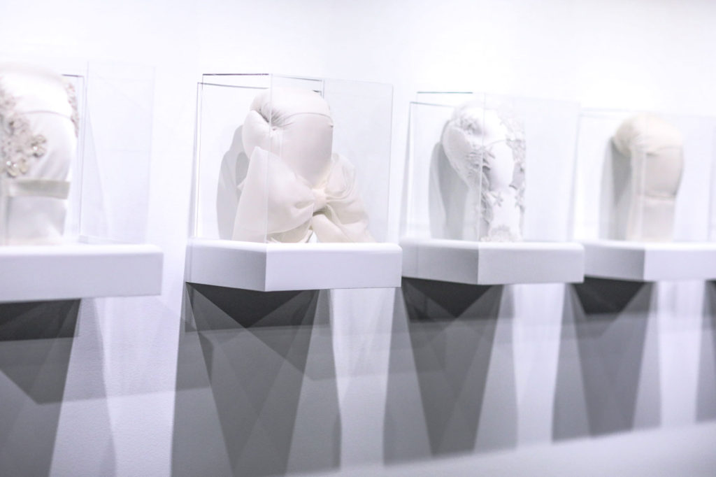 Wedding dress boxing glove sculptures mounted